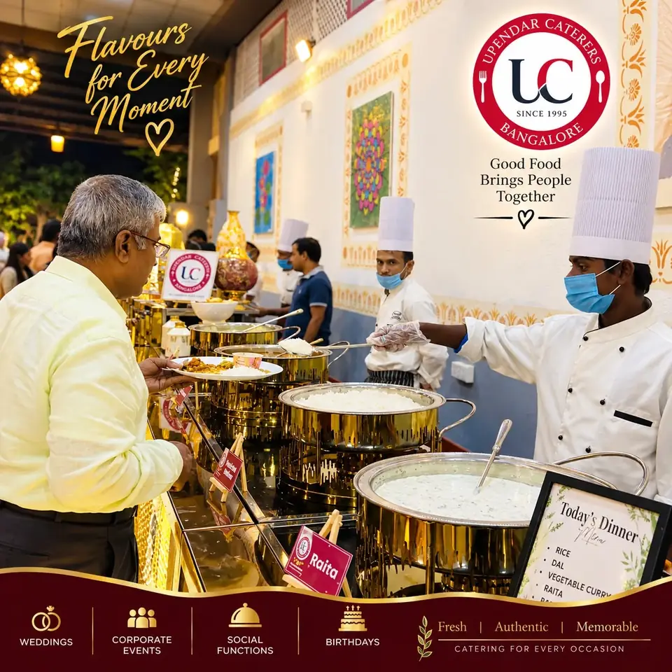 A guest being served by masked catering staff at an Upendar Caterers buffet counter